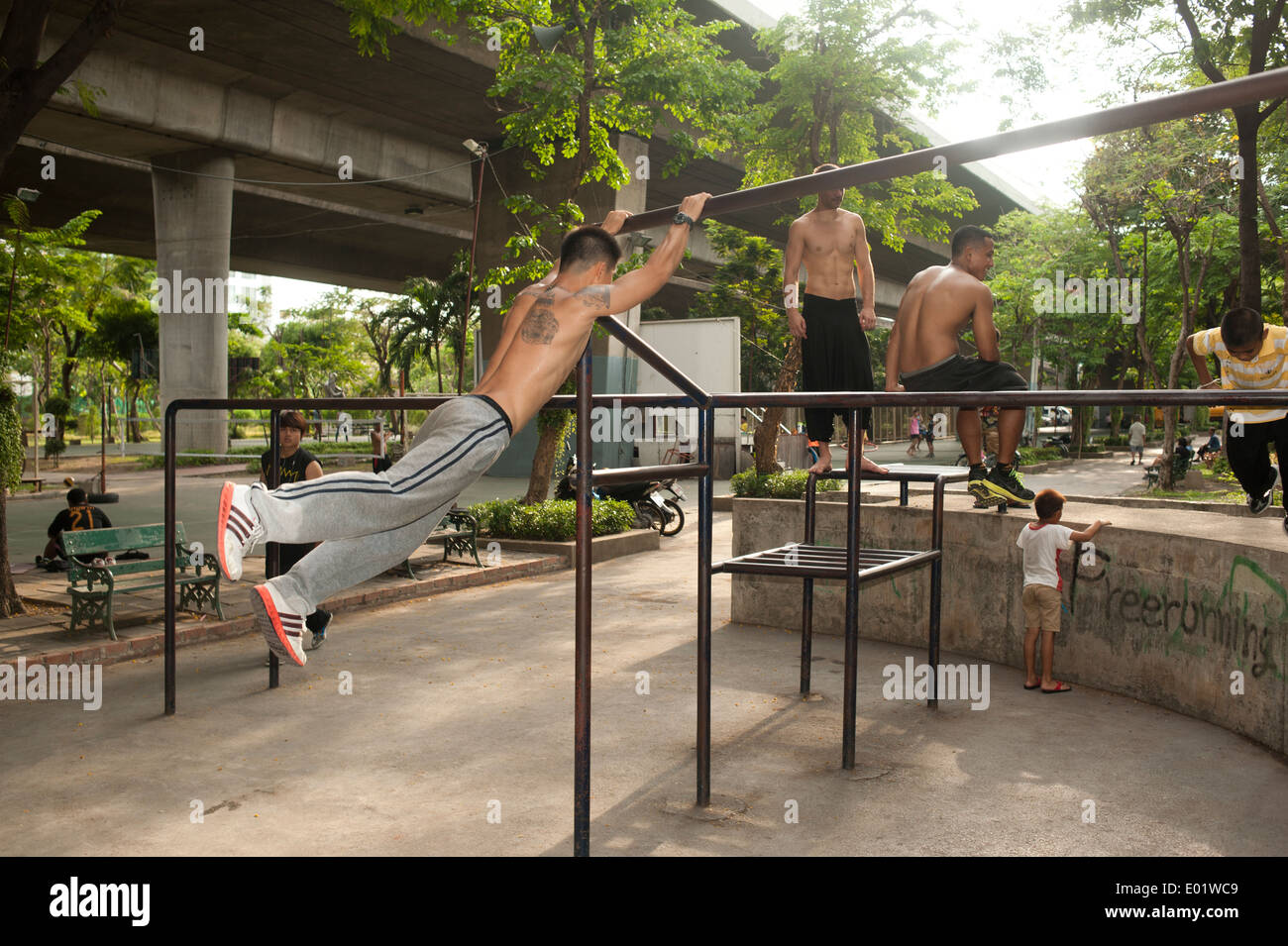 Babngkok, Thailand - Young men practicing freerunning Stock Photo