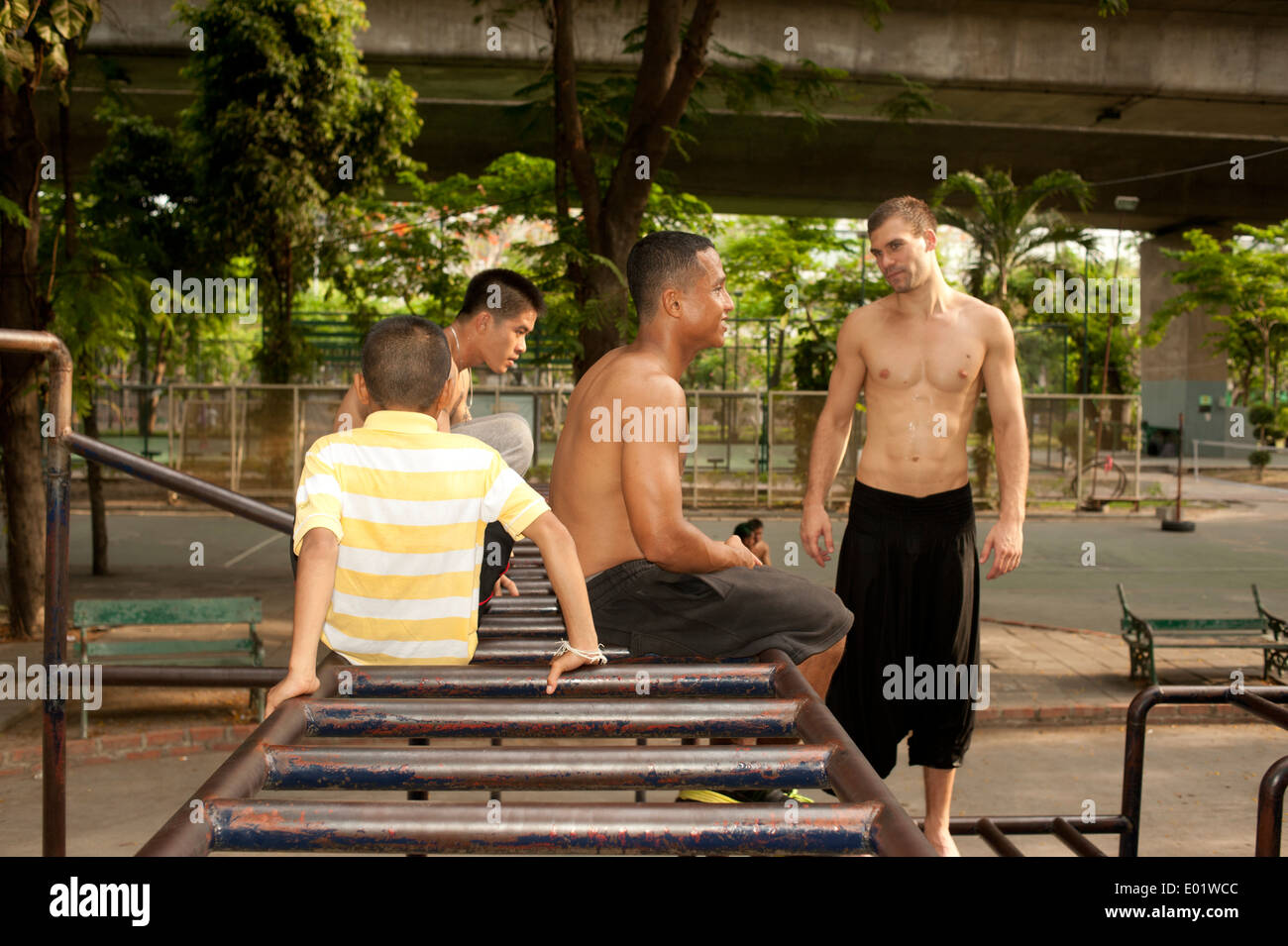 Babngkok, Thailand - Young men practicing freerunning Stock Photo