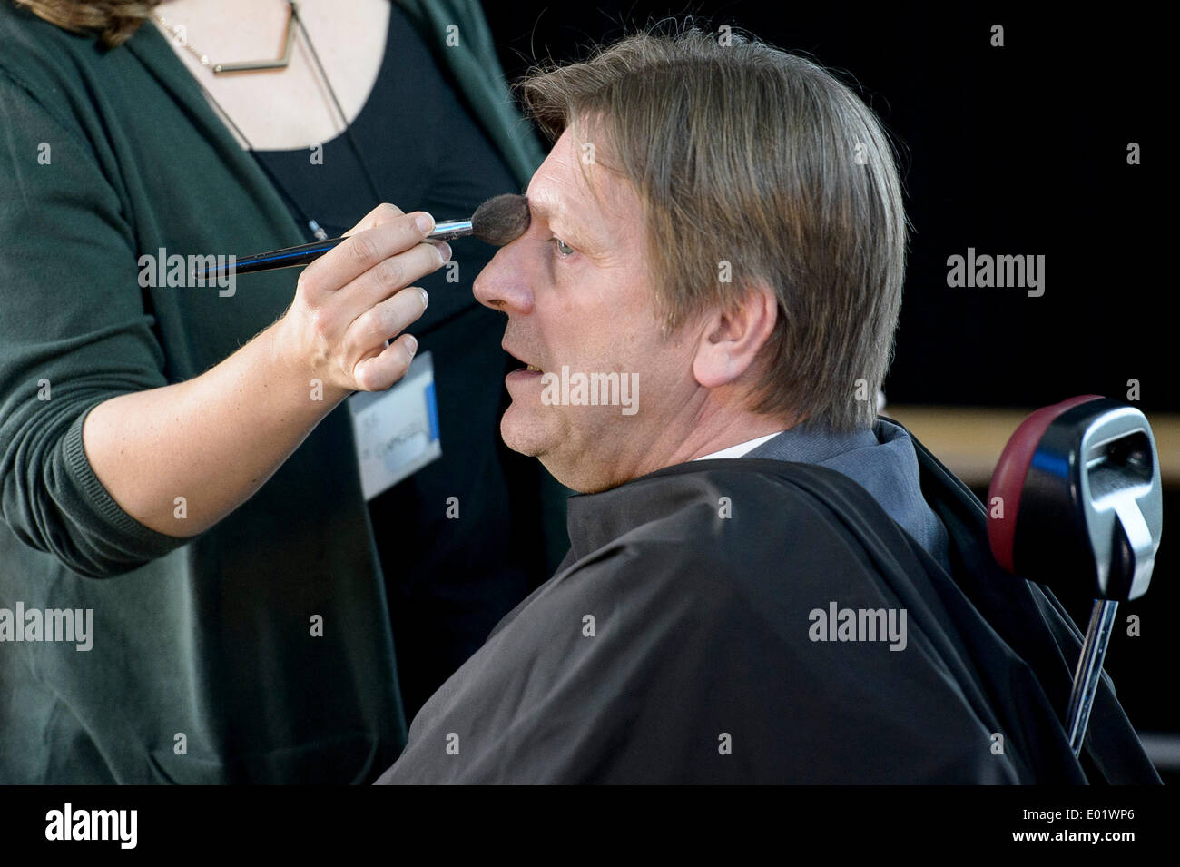 Brussels, Belgium. 29th April 2014. Guy Verhofstadt, top candidate of Liberals (ALDE) receives the make-up ahead of Euranet's 'Big Crunch' Presidential debate at the EU parliament in BrusselsThe four top candidates for the presidency of the European Commission - Jean-Claude Juncker, Ska Keller, Martin Schulz and Guy Verhofstadt - attend EU-wide debate organized by EuranetPlus and focused on the major election topics. Credit:  dpa picture alliance/Alamy Live News Stock Photo