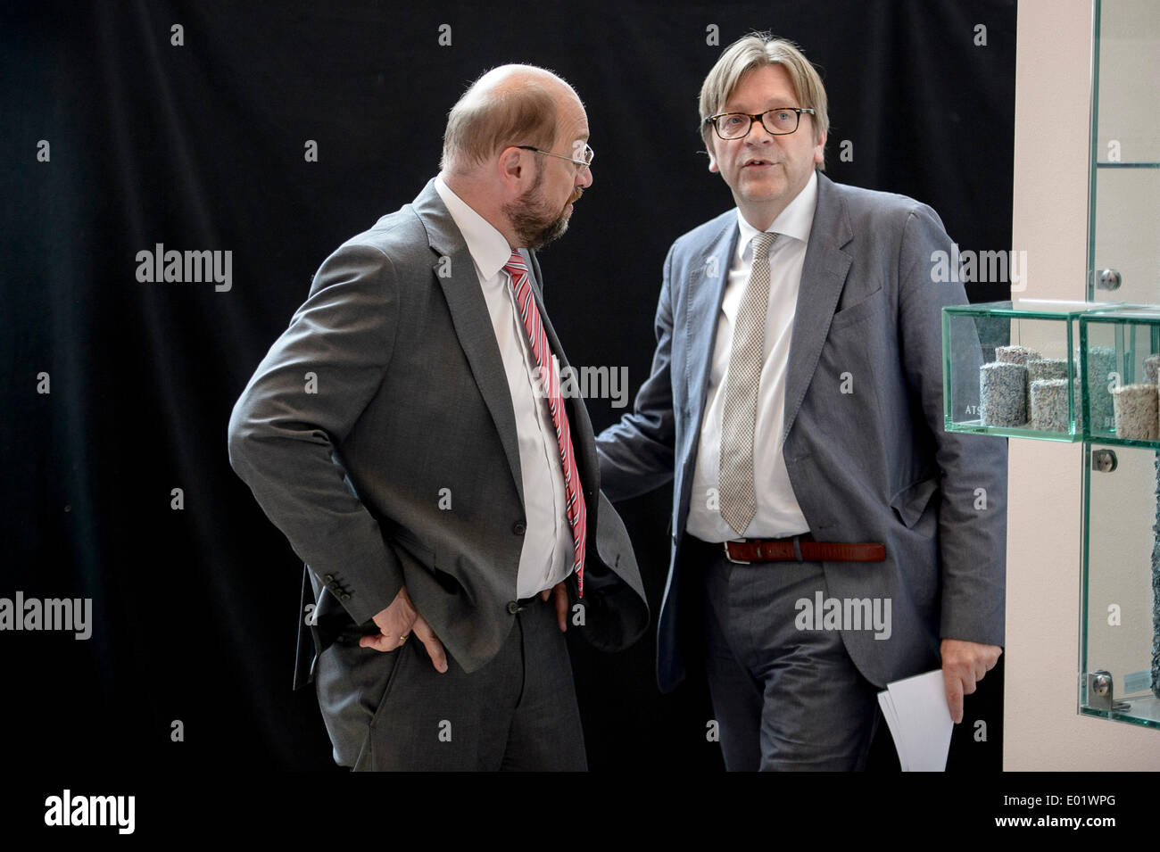 Brussels, Belgium. 29th April 2014. Guy Verhofstadt (L), top candidate of Liberals (ALDE) and Martin Schulz (R ), top candidate of the Party of European Socialists (PSE) chat ahead of Euranet's 'Big Crunch' Presidential debate at the EU parliament in BrusselsThe four top candidates for the presidency of the European Commission - Jean-Claude Juncker, Ska Keller, Martin Schulz and Guy Verhofstadt - attend EU-wide debate organized by EuranetPlus and focused on the major election topics. Credit:  dpa picture alliance/Alamy Live News Stock Photo