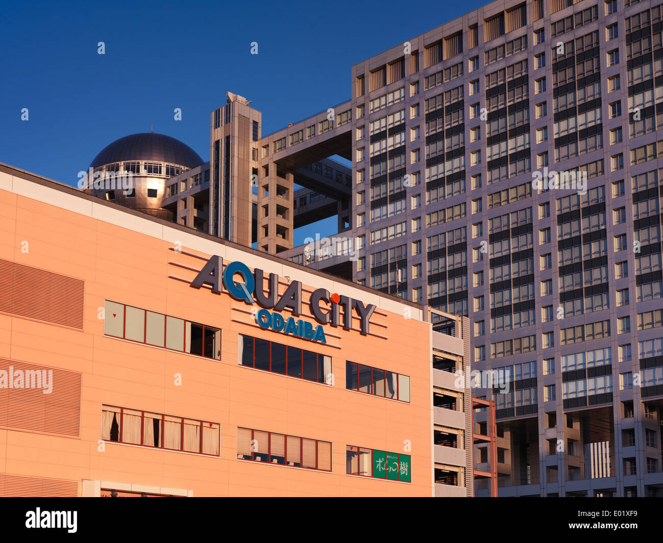 Aqua city sign and Fuji TV building in the background, tourist attractions in Odaiba, Tokyo, Japan Stock Photo