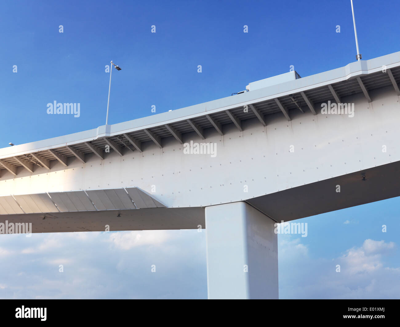 Truck on an elevated highway over blue sky. Tokyo, Japan. Stock Photo