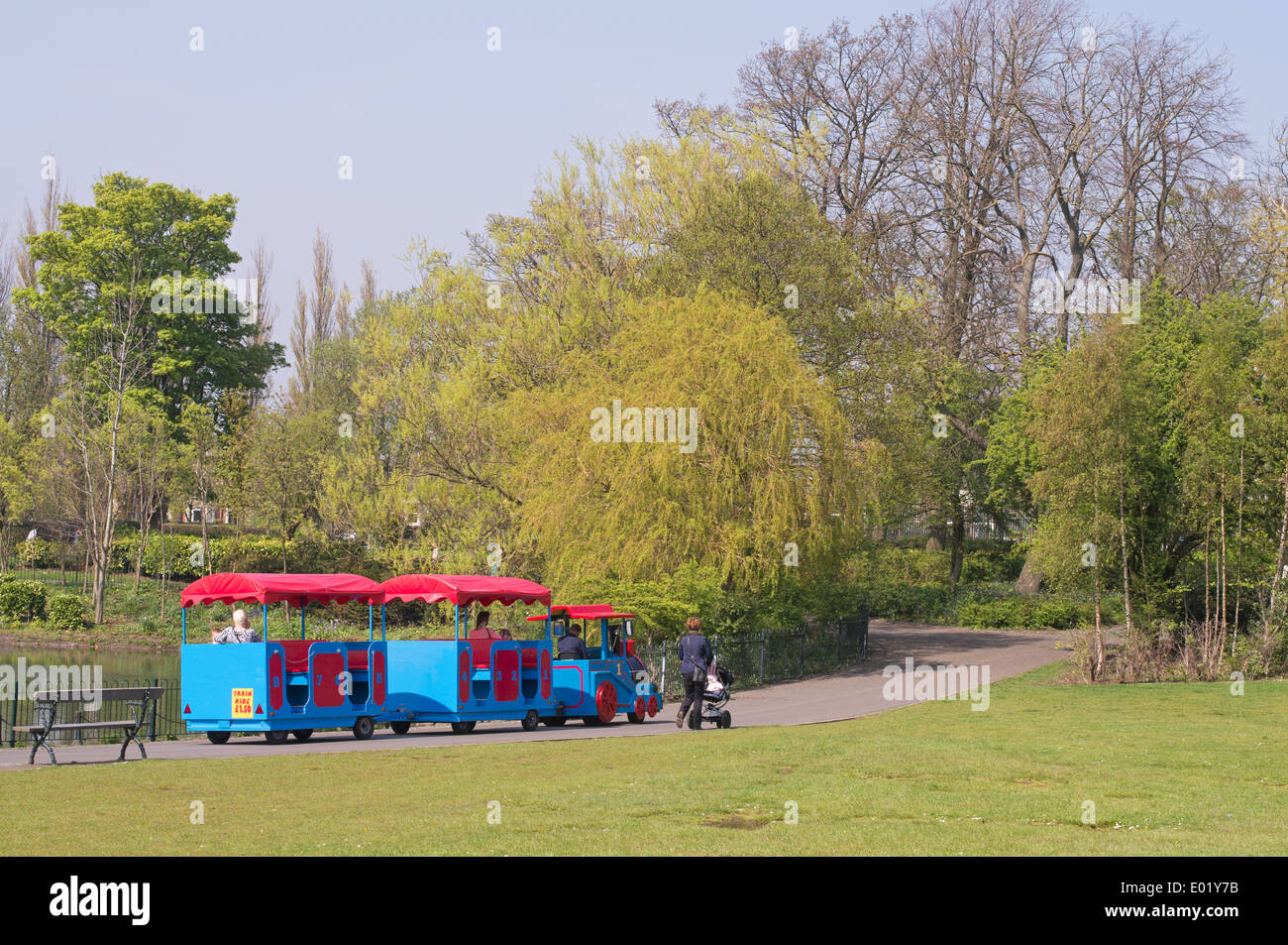 A road train as a visitor attraction within Saltwell Park Gateshead north east England UK Stock Photo