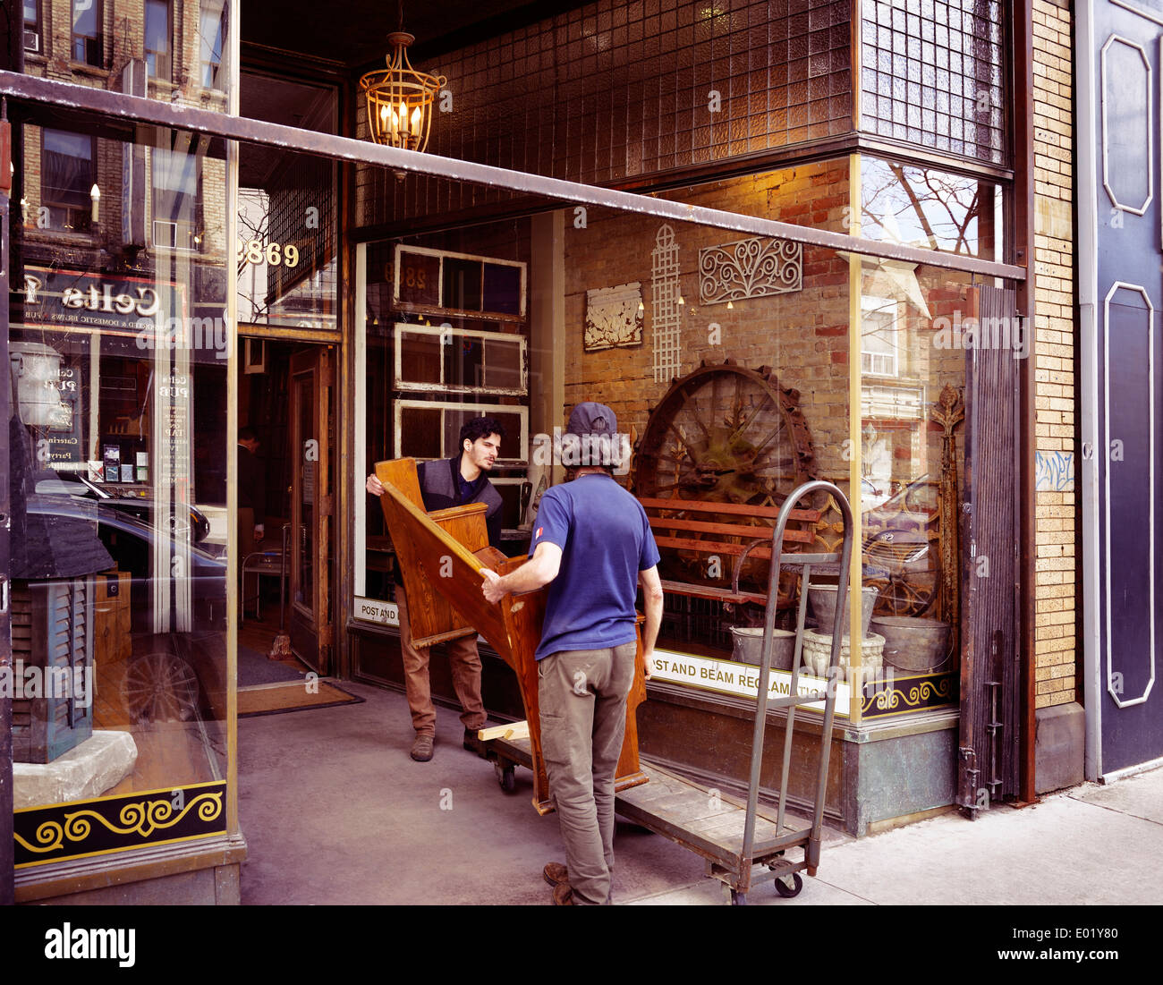 License available at Workers delivering furniture to Post and Beam Reclamation