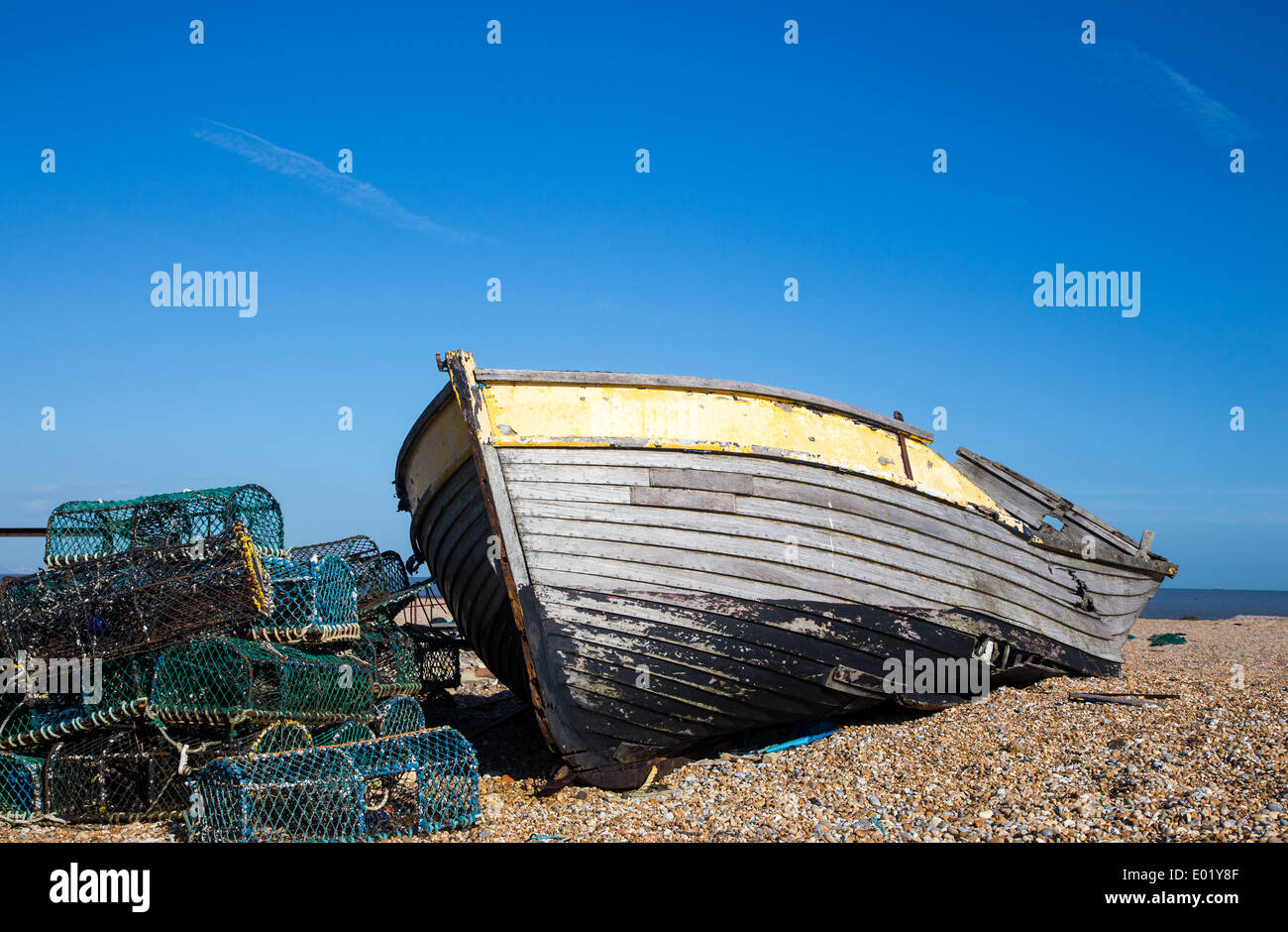 Abandoned fishing boats on the beach at Dungeness Kent Stock Photo - Alamy