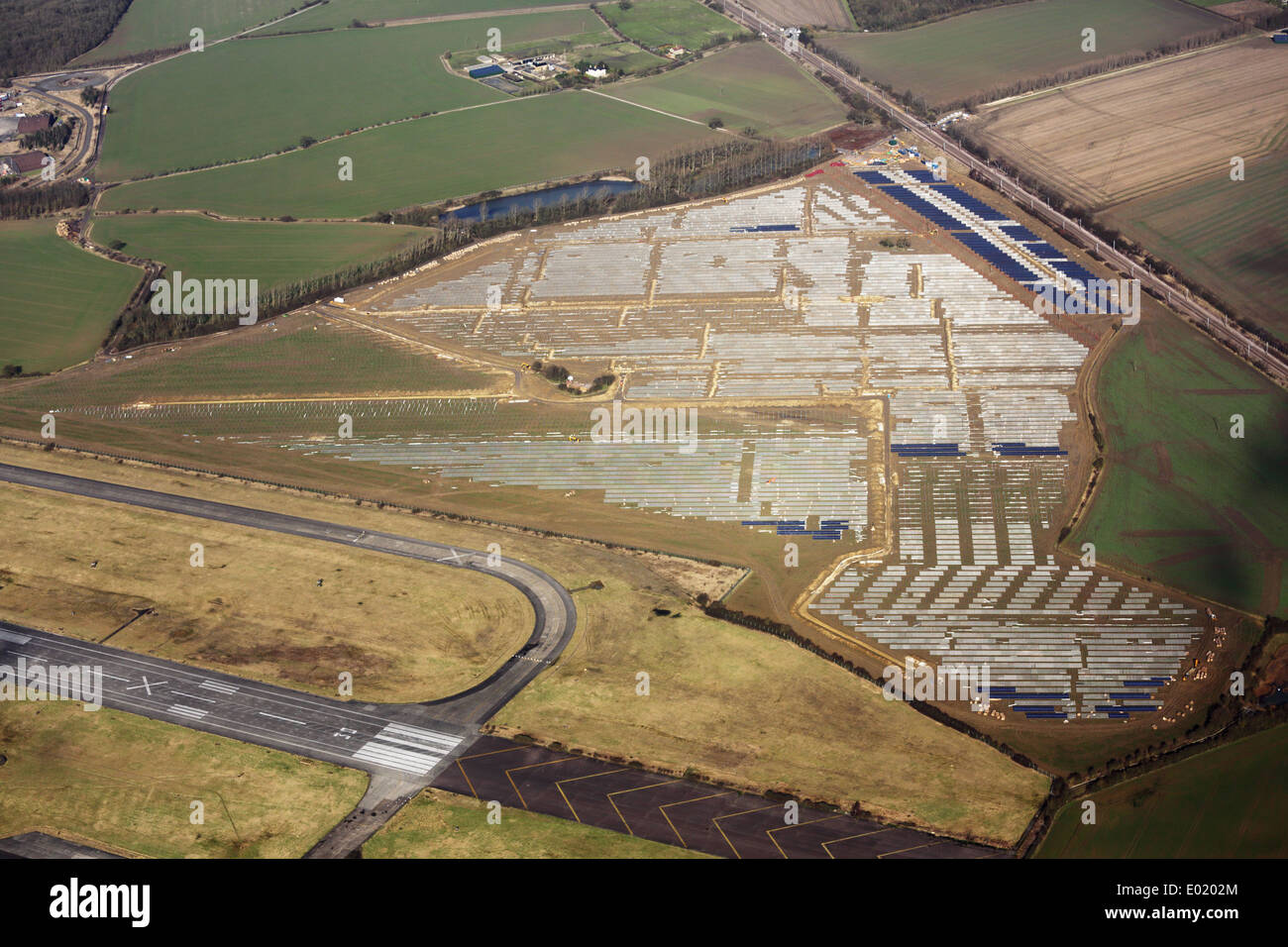 Aerial View of Solar Farm Under Construction, Alconbury Airfield, near Abbot's Ripton Stock Photo