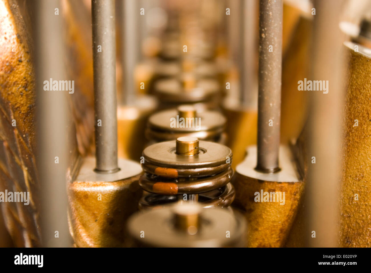 A close up of a head off a internal combustion engine including valve