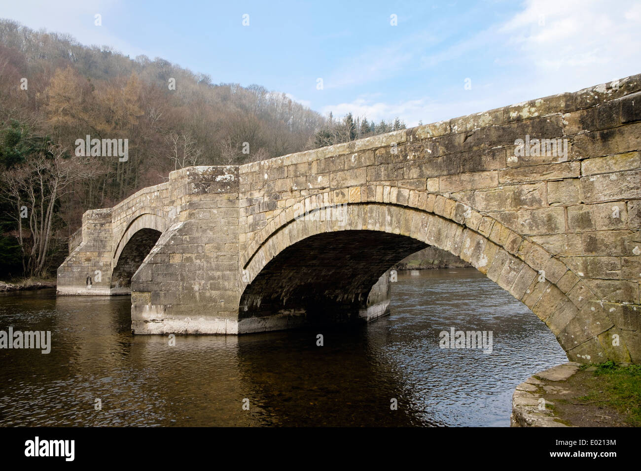 16th century stone arched bridge across River Eamont in Lake District National Park, Pooley Bridge Cumbria England UK Britain Stock Photo