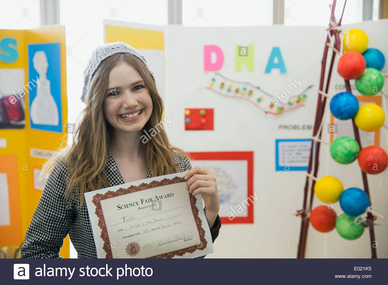 Portrait of school girl with award at science fair Stock Photo