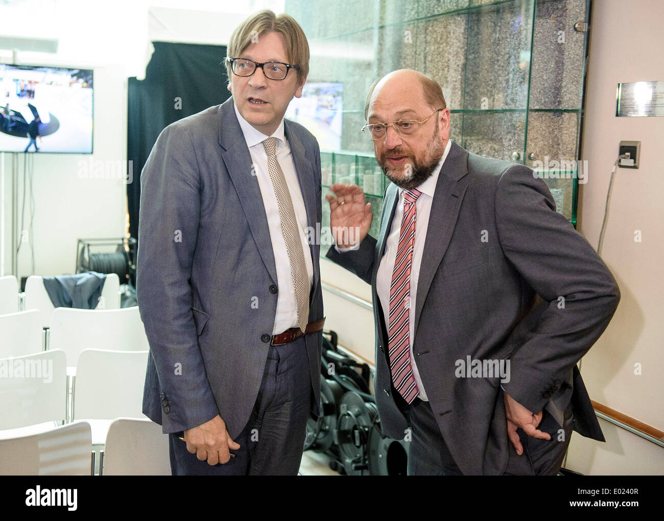 Brussels, Bxl, Belgium. 29th Apr, 2014. Guy Verhofstadt (L), top candidate of Liberals (ALDE) and Martin Schulz (R ), top candidate of the Party of European Socialists (PSE) chat ahead of Euranet's 'Big Crunch' Presidential debate at the EU parliament in Brussels, Belgium on 29.04.2014 The four top candidates for the presidency of the European Commission - Jean-Claude Juncker, Ska Keller, Martin Schulz and Guy Verhofstadt - attend EU-wide debate organized by EuranetPlus and focused on the major election topics. by Wiktor Dabkowski Credit:  Wiktor Dabkowski/ZUMAPRESS.com/Alamy Live News Stock Photo