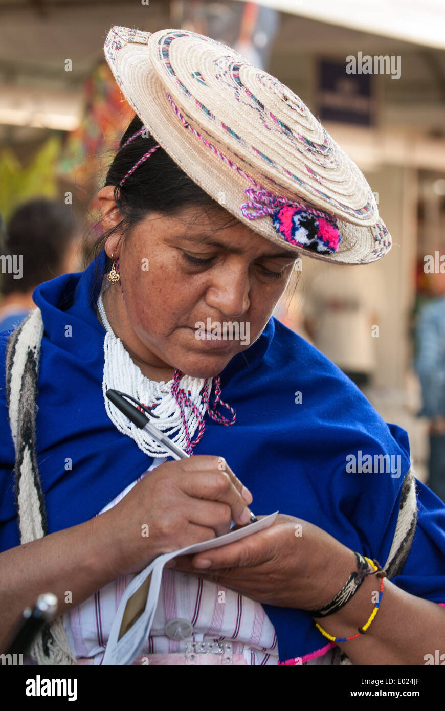 A colombian indigenous woman makes notes about the discussions. The People's Summit at the United Nations Conference on Sustainable Development, Rio de Janeiro, Brazil. Stock Photo
