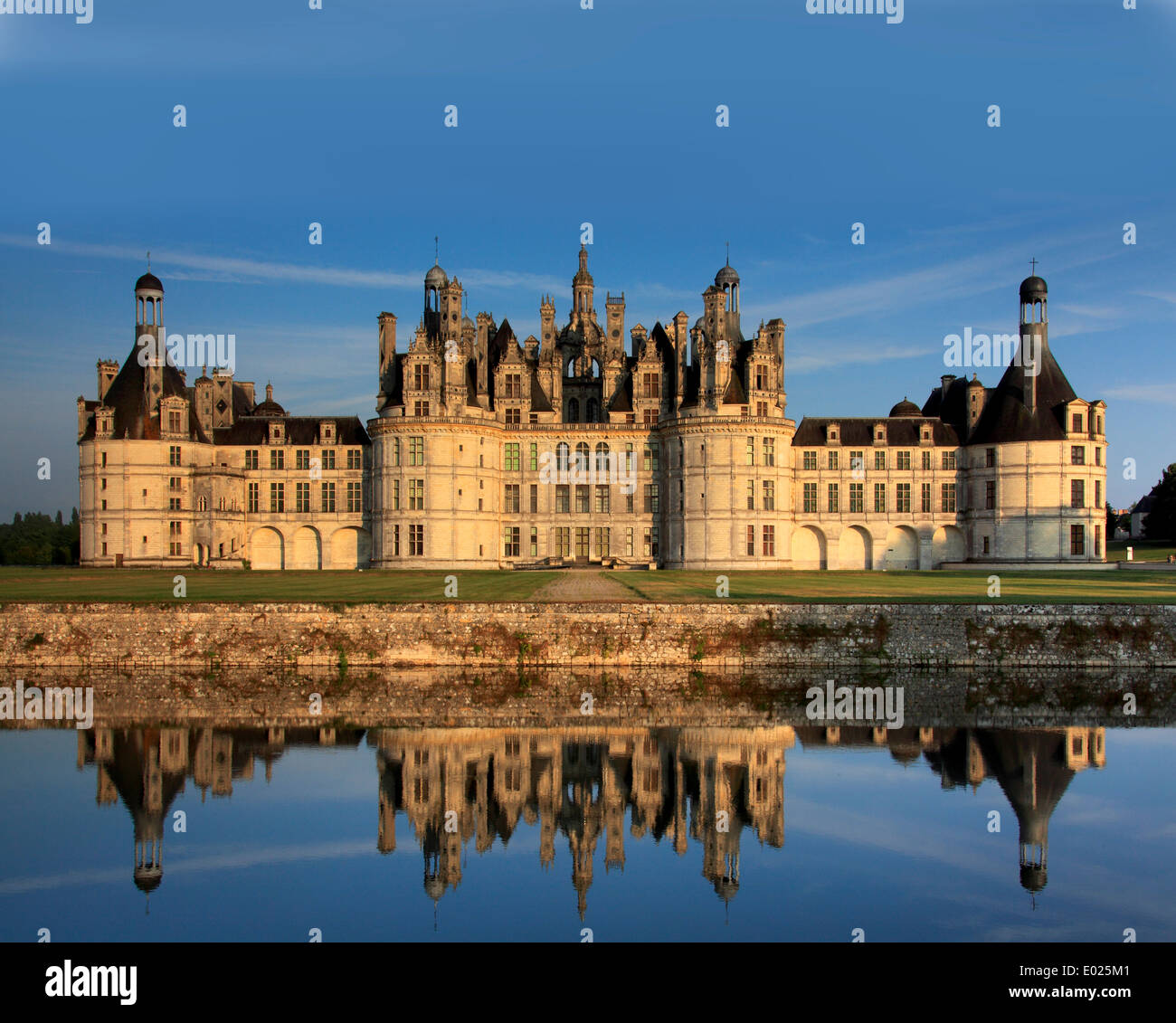 Photo of the north side of Chateau de Chambord, reflecting in evening and night lighting, Chambord, Loire Valley, France Stock Photo