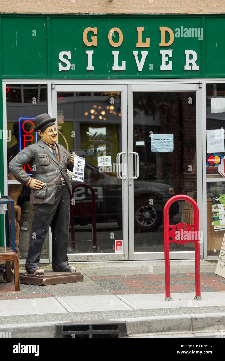 Life size replica of Oliver Hardy outside pawn shop in historic Chinatown-Victoria, British Columbia, Canada. Stock Photo