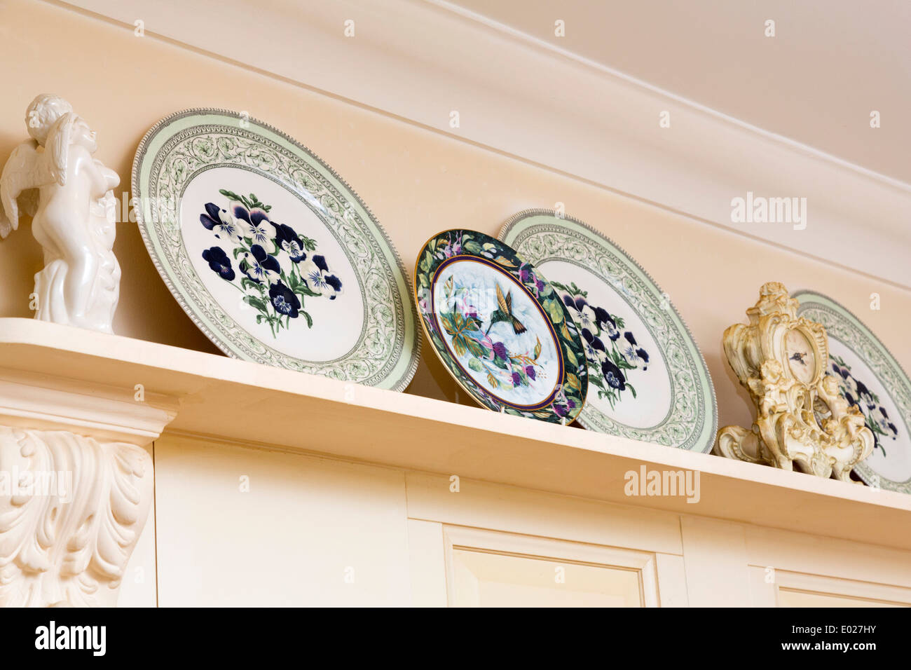 plates on display in a kitchen Stock Photo