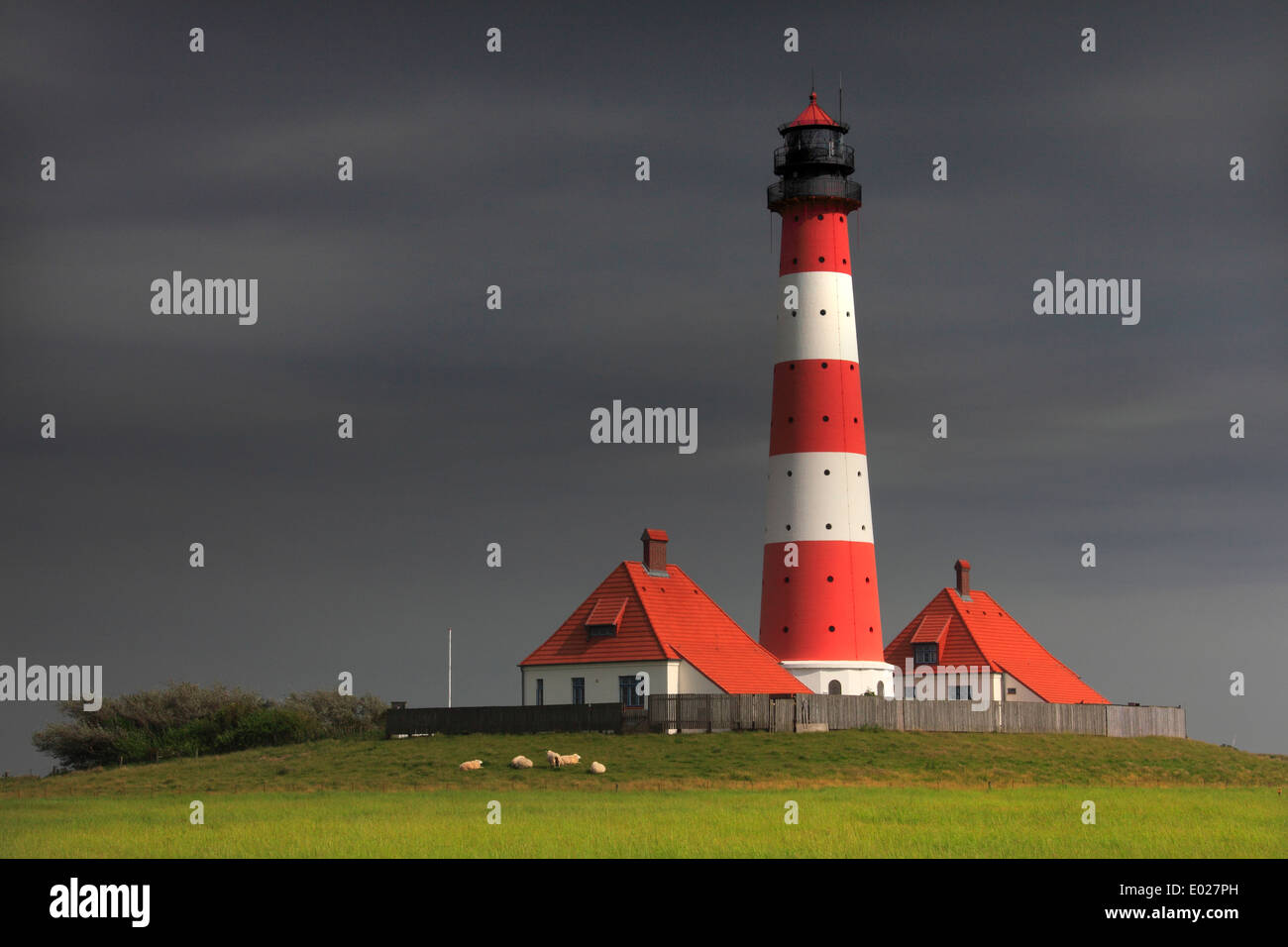 Red and white striped lighthouse hi-res stock photography