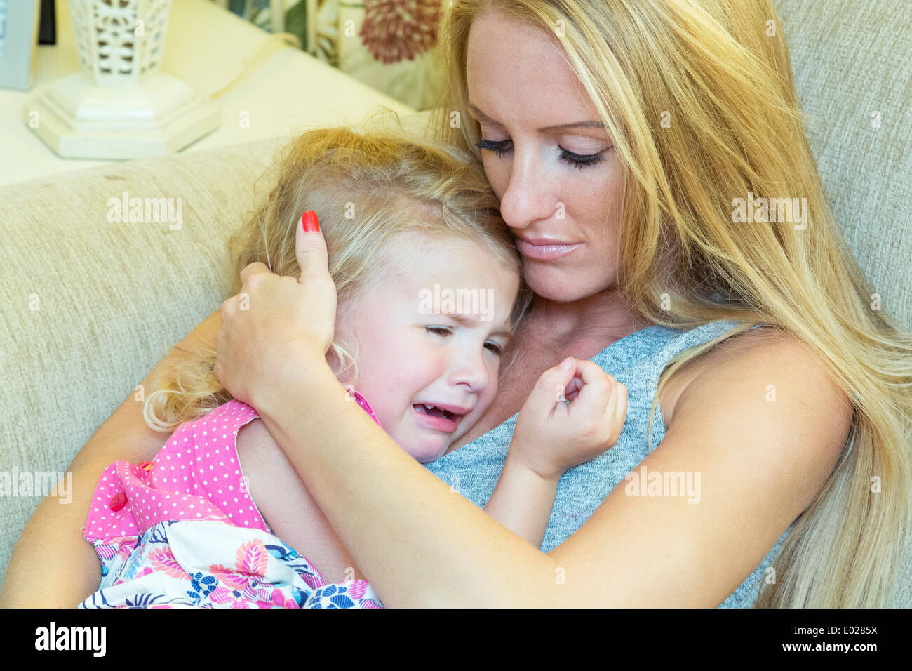 Young Mother Comforting Her Daughter Stock Photo 68891814 Alamy