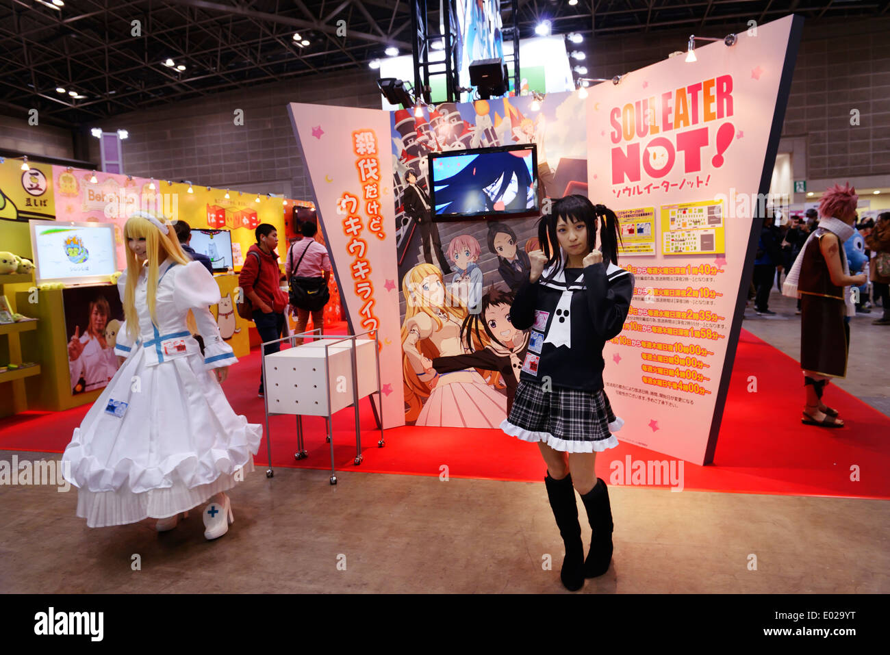Japanese female dressed in as Maka Albarn with Soul Eater Scythe poses in  front of image of her anime character, Tokyo International Anime Fair,  Japan Stock Photo - Alamy