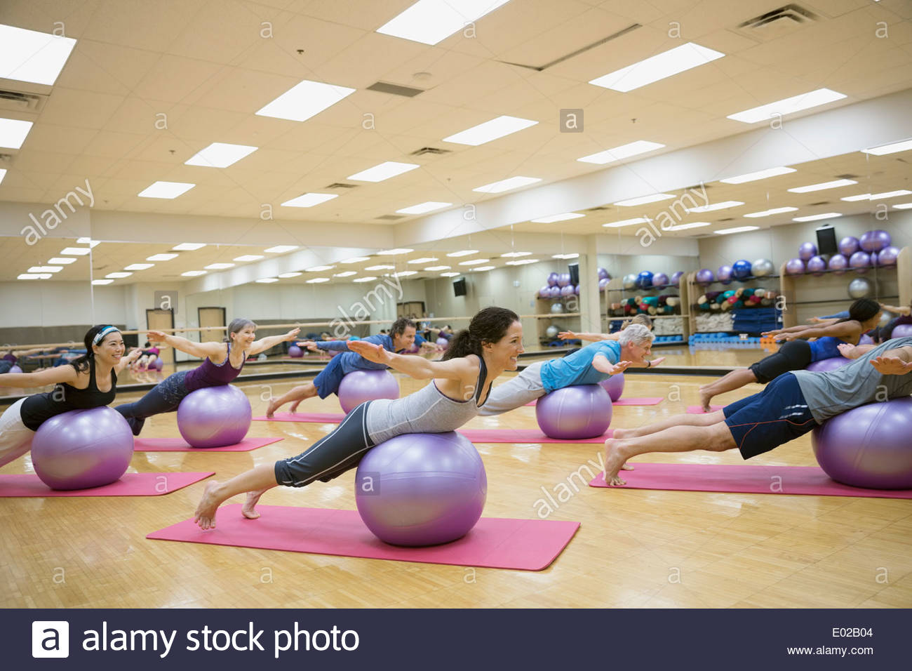 Group balancing on fitness balls in exercise class Stock Photo Alamy