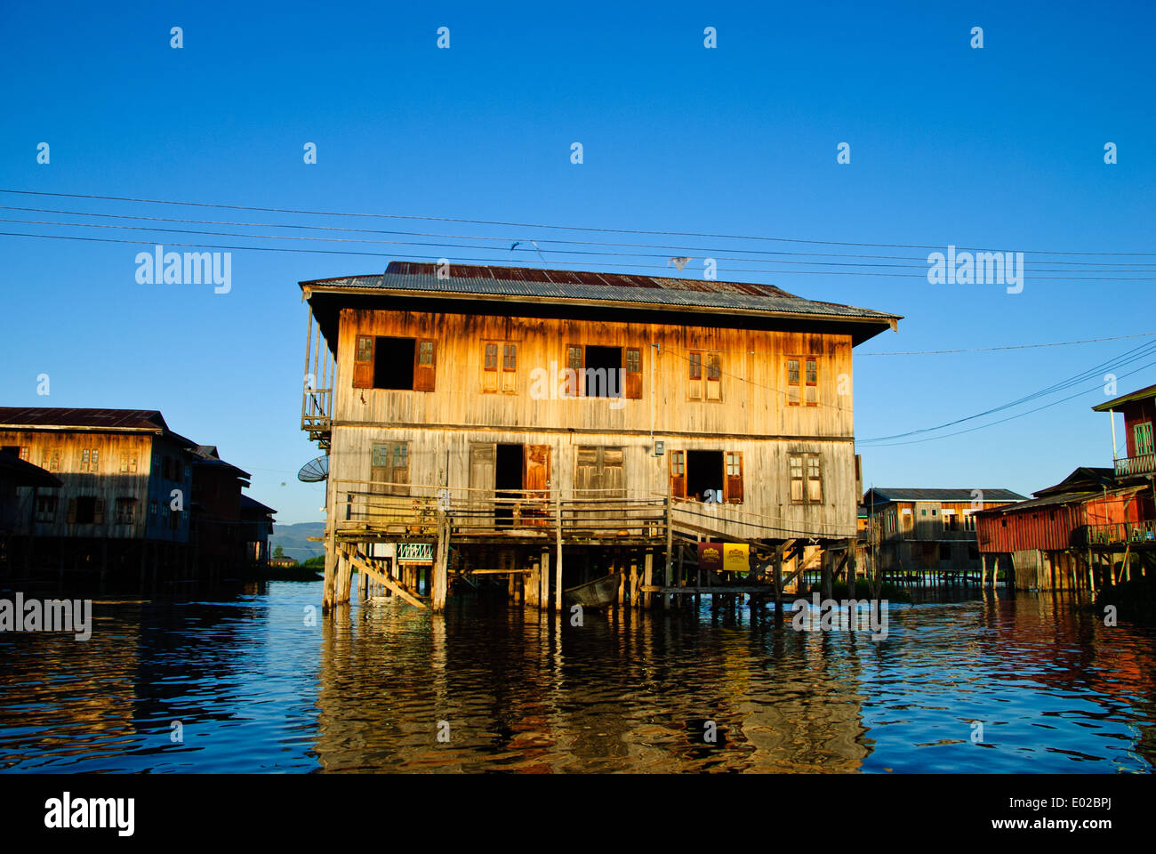 A floating house built on stilts at Inle Lake. Stock Photo