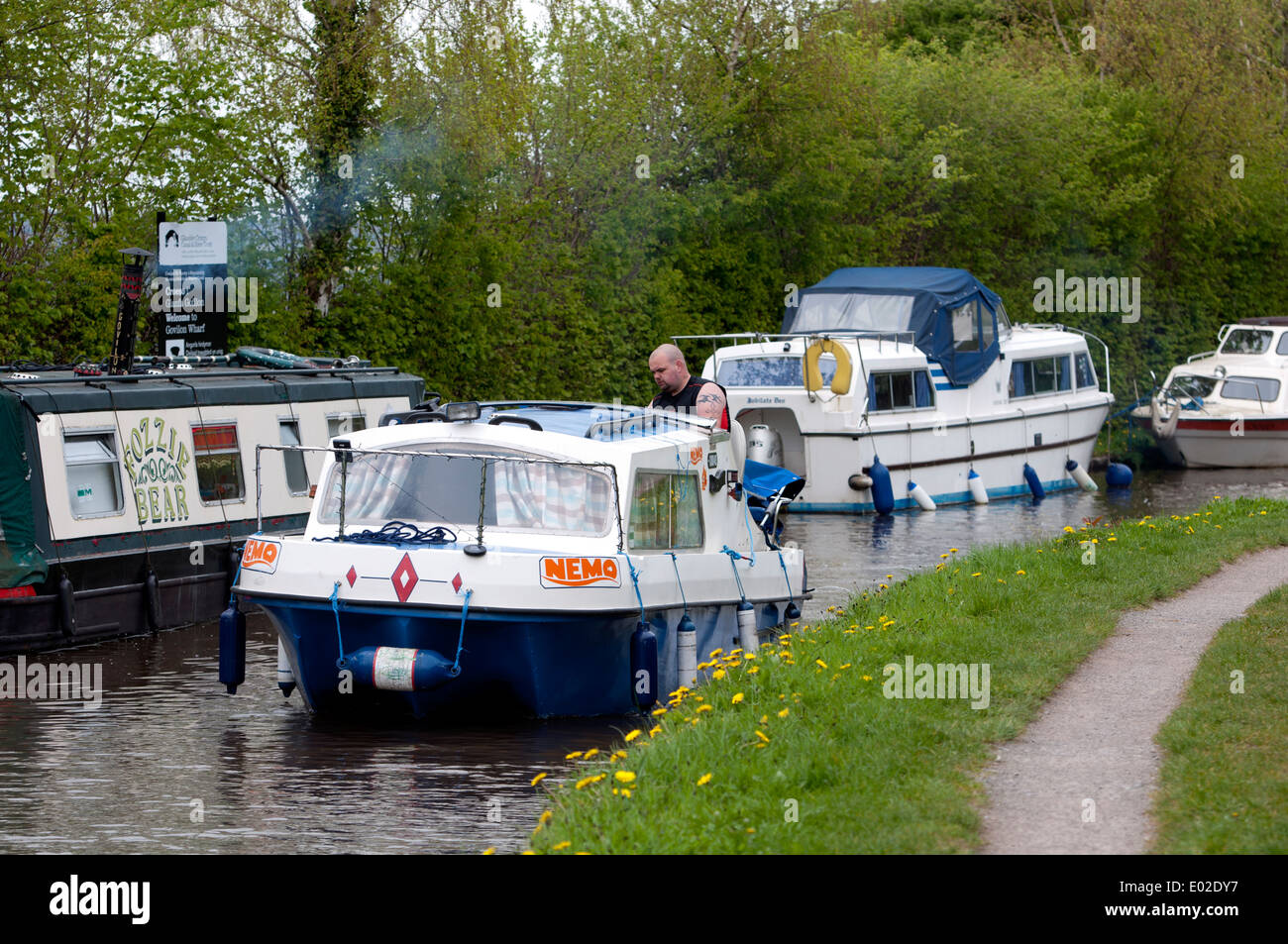 Cabin cruiser on the Monmouthshire and Brecon Canal at Govilon