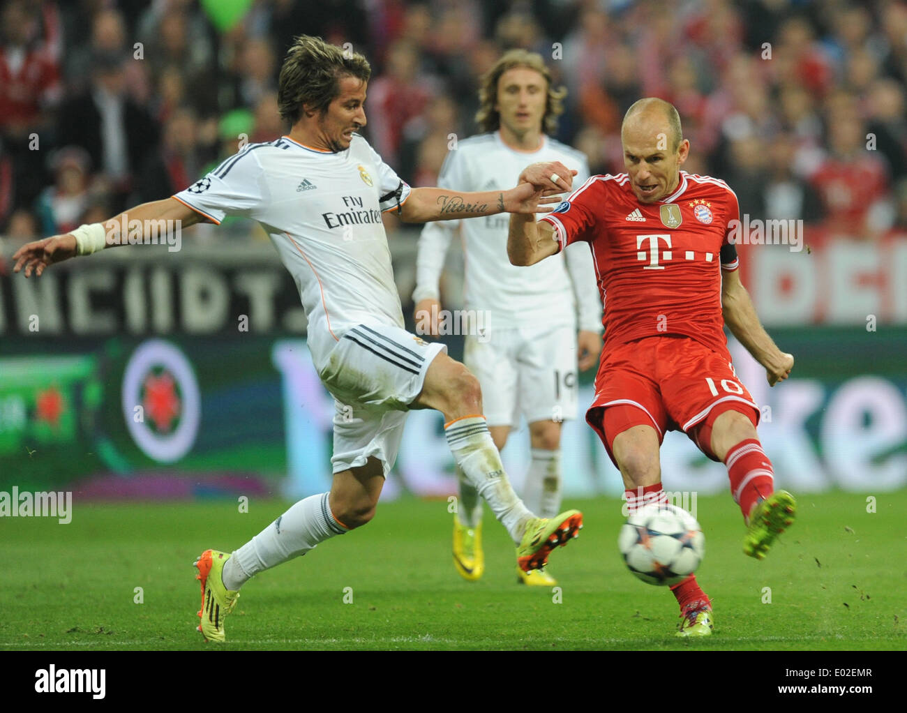 Munich, Germany. 28th Mar, 2014. Munich's Arjen Robben in action against Madrid's Fabio Coentrao during the Champions League semi-final second leg match between FC Bayern Munich and Real Madrid at Arena in Munich, Germany, 28 March 2014. Photo: Andreas Gebert/dpa/Alamy Live News Stock Photo