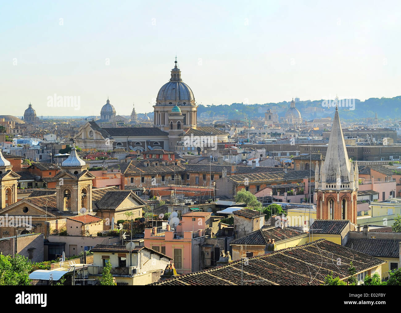 Aerial colorful view of Rome at sunset. Italy Stock Photo
