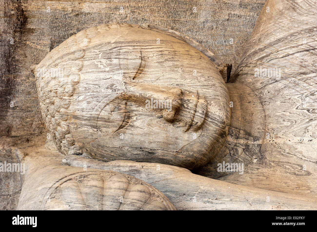 Head and face of a reclining Buddha statue, Sayana Mudra, rock relief, Gal Vihara Temple, Polonnaruwa, North Central Province Stock Photo