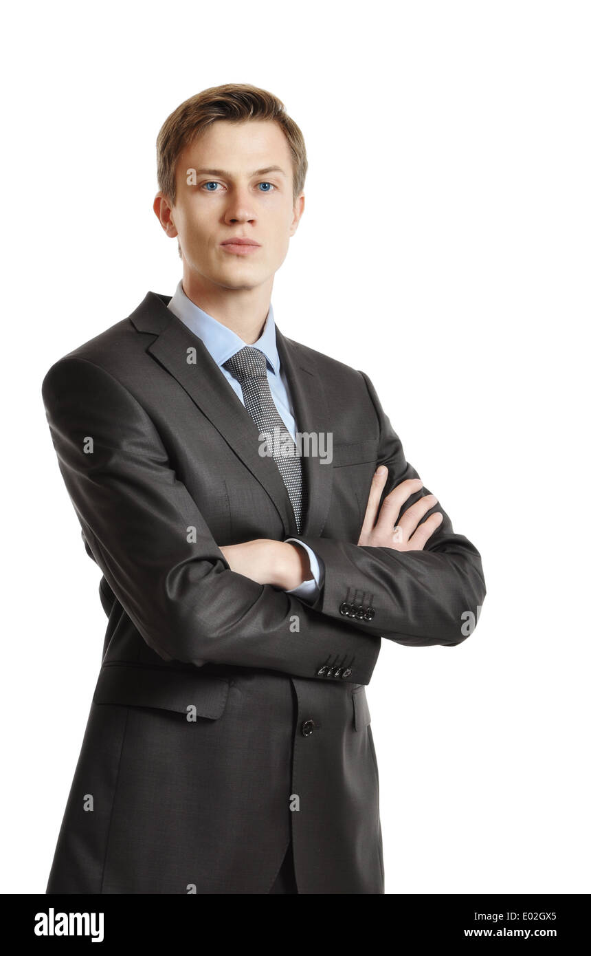 Young handsome businessman in black suit and tie isolated on white ...