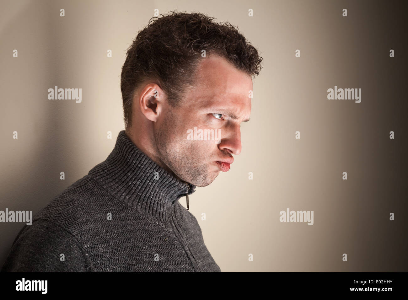 Angry emotional young Caucasian man portrait Stock Photo