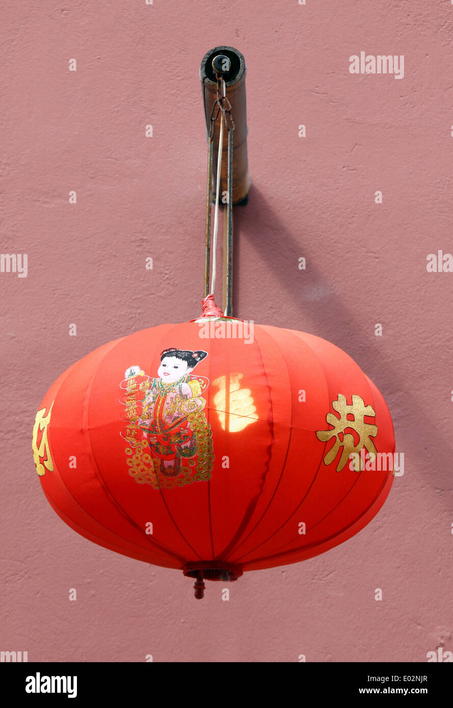 Traditional chinese lantern hanging on the wall Stock Photo - Alamy