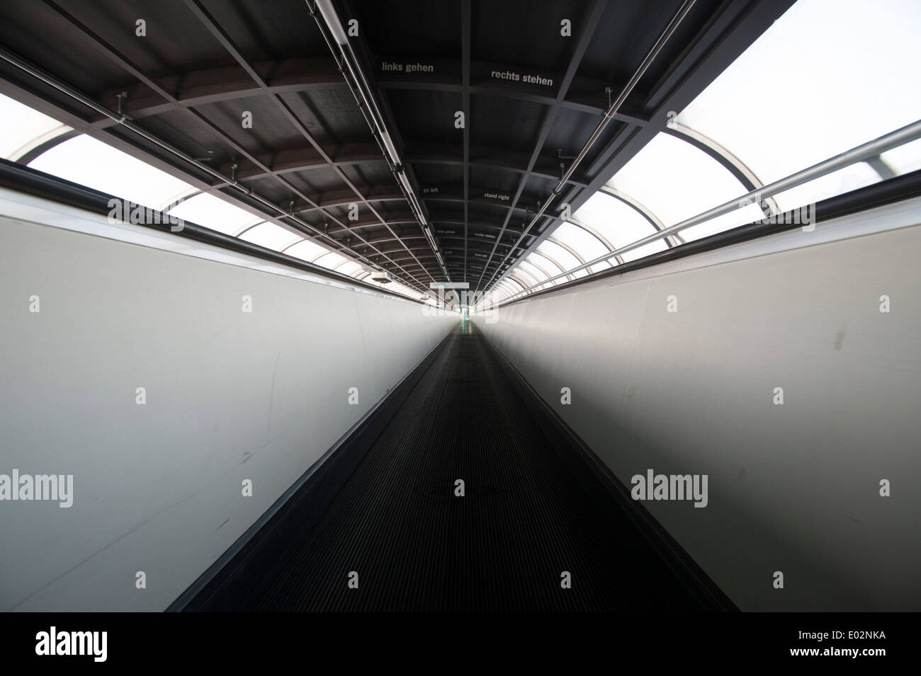 moving sidewalk in oval tunnel connecting exhibition halls on Fair Ground Düsseldorf, Germany Stock Photo