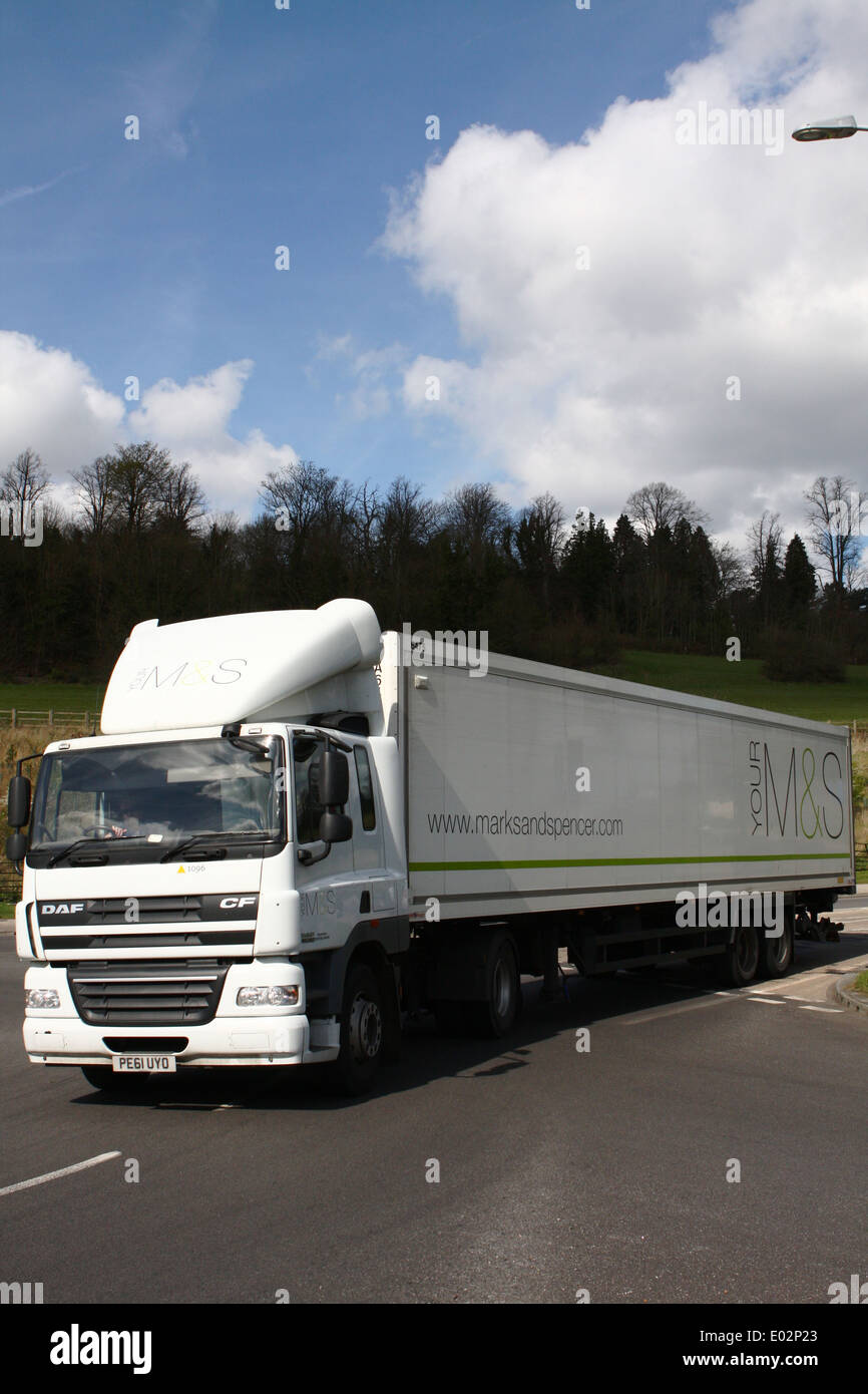 An M&S truck entering a roundabout in Coulsdon, Surrey, England Stock Photo