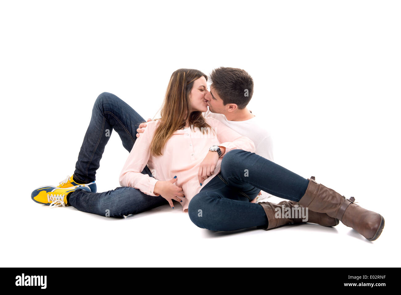 Young couple kissing isolated in white Stock Photo