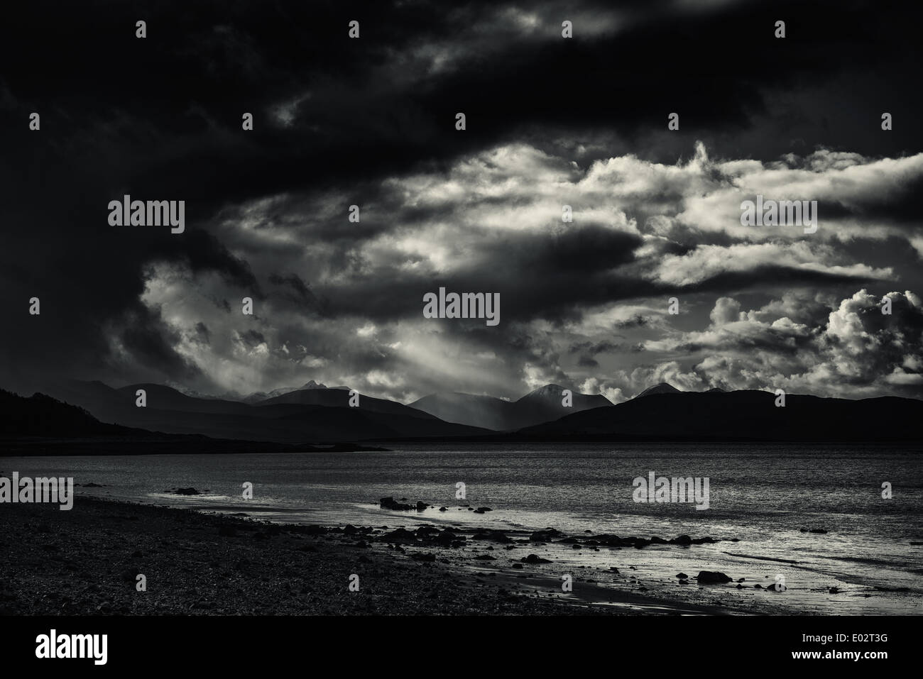 Storm clouds form over the Black Cuillin mountains on the Isle of Skye.Scotland Stock Photo