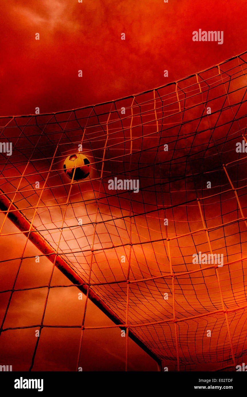 soccer ball in the net, goal scoring Stock Photo