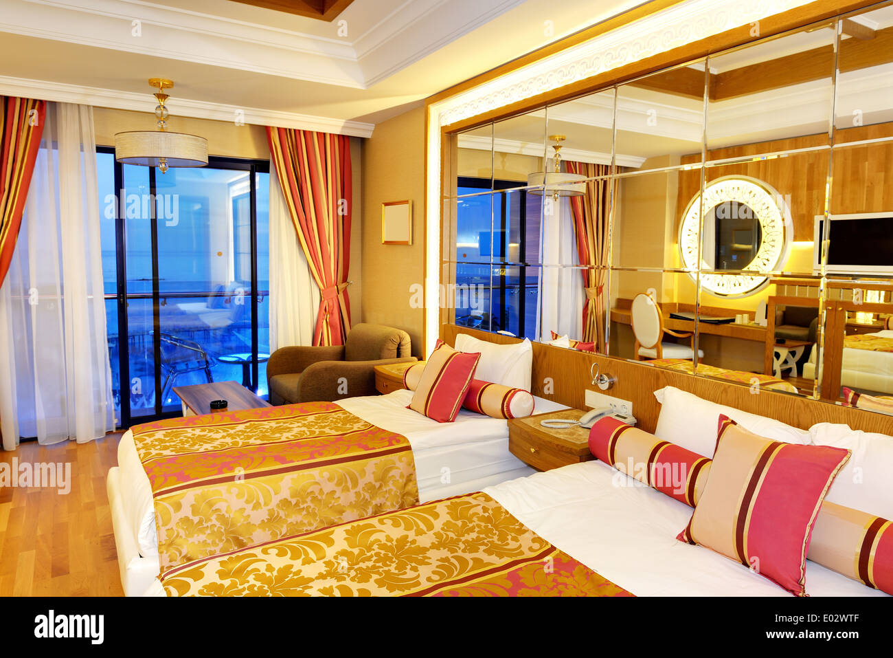 Apartment in the luxury hotel in night illumination, Antalya, Turkey Stock Photo