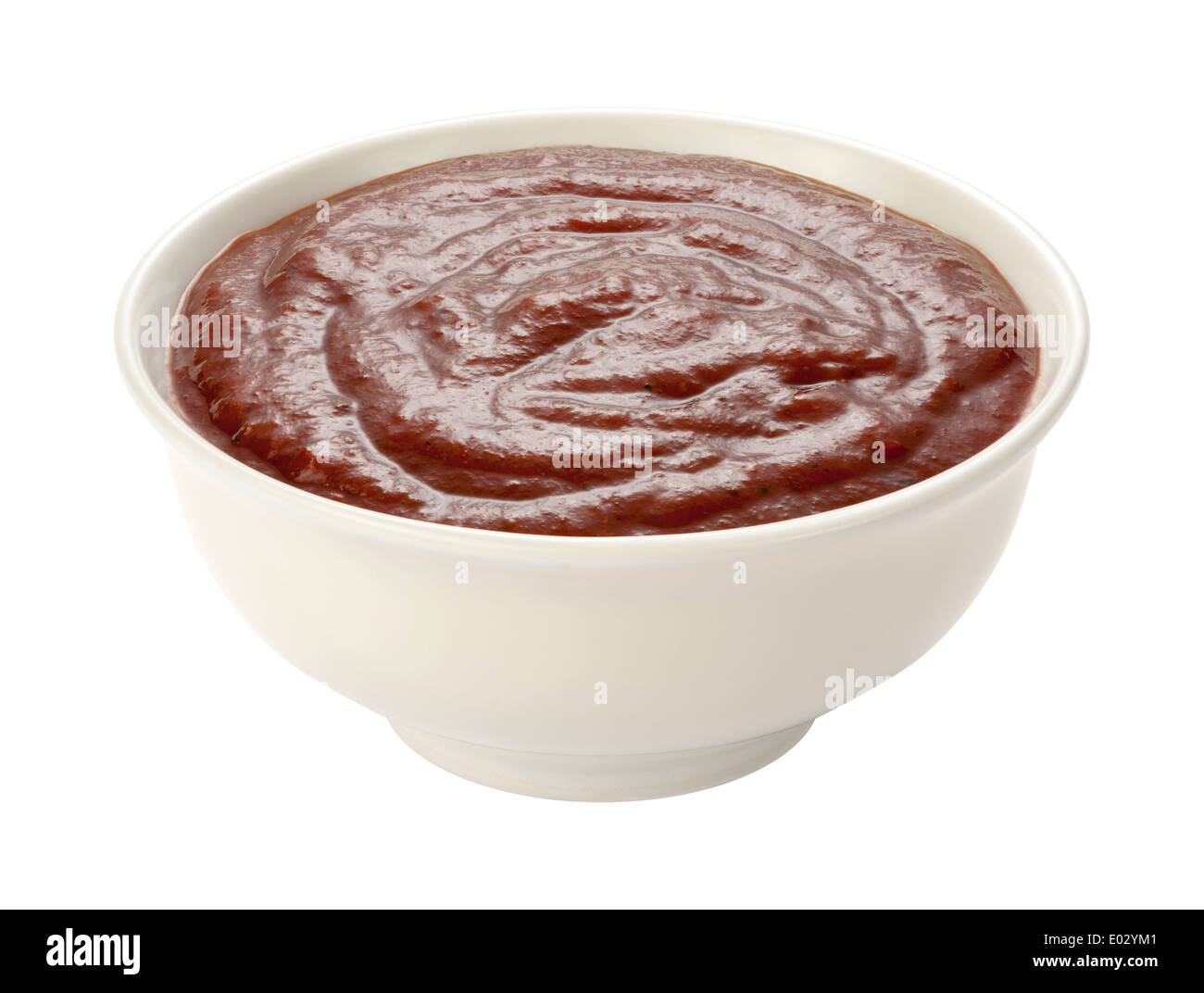 Barbecue Sauce in a white bowl, isolated on white. Stock Photo