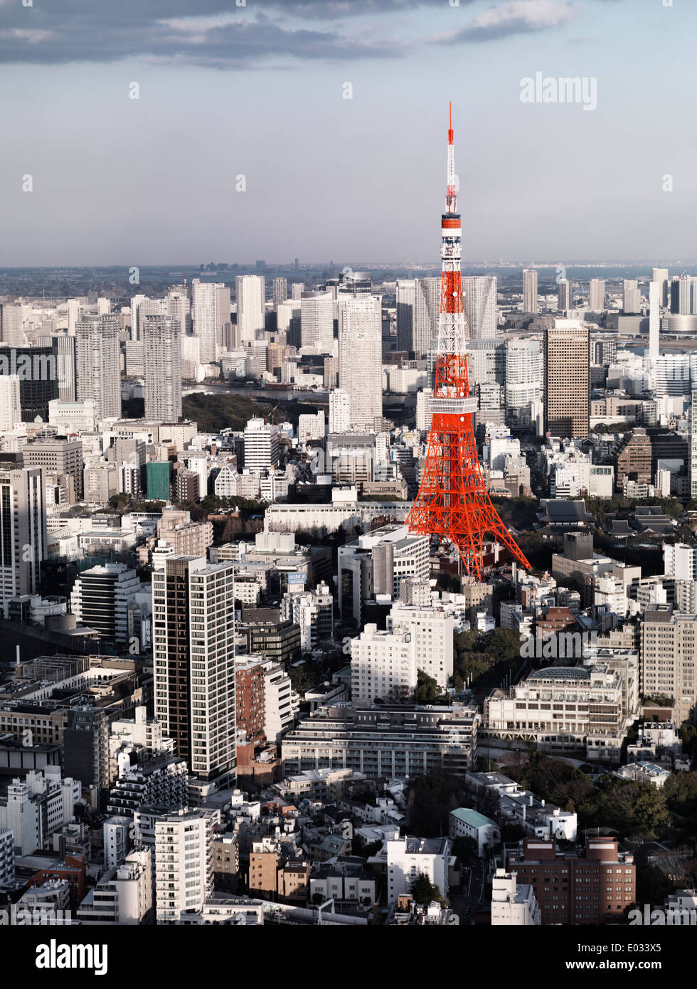 License available at MaximImages.com - Bright red Tokyo Tower in city landscape aerial view, artistic photo. Tokyo, Japan. Stock Photo