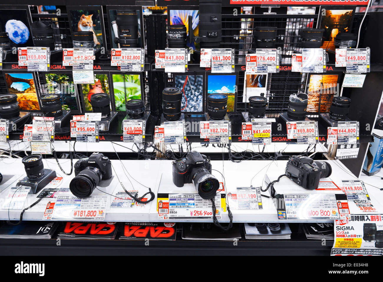 Cameras and lenses on display in electronics store Yodobashi Camera, Yodobashi-Akiba in Akihabara, Tokyo, Japan. Stock Photo