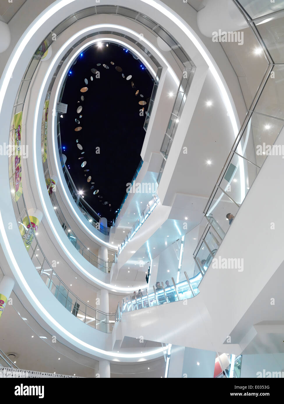 Abstract architectural photo of escalators and multiple levels of Diver City shopping complex in Odaiba, Tokyo, Japan Stock Photo