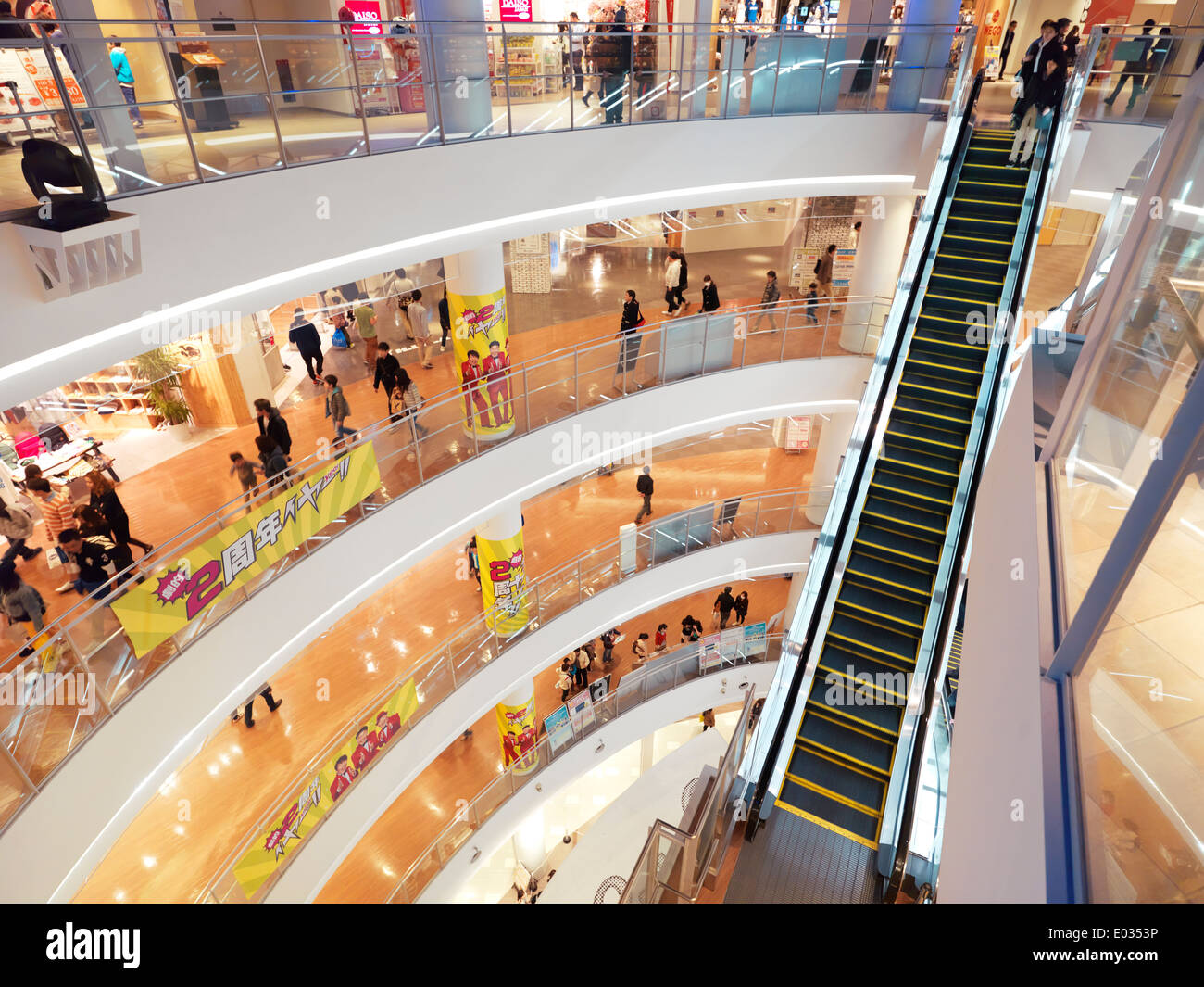 Multiple levels and escalators at Diver City shopping complex in Odaiba, Tokyo, Japan Stock Photo