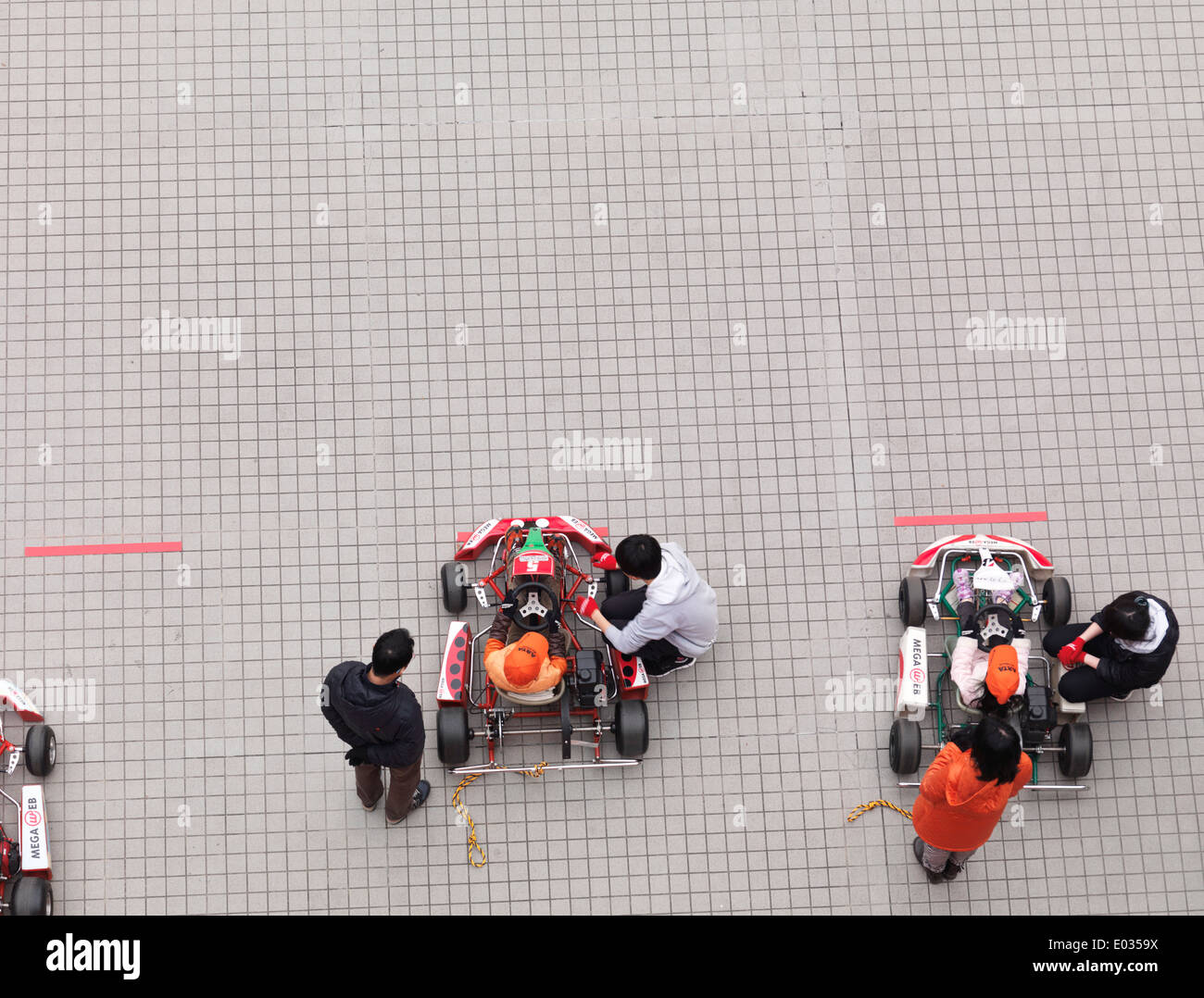 Children riding go-karts at Toyota Mega Web, Odaiba, Tokyo, Japan Stock Photo