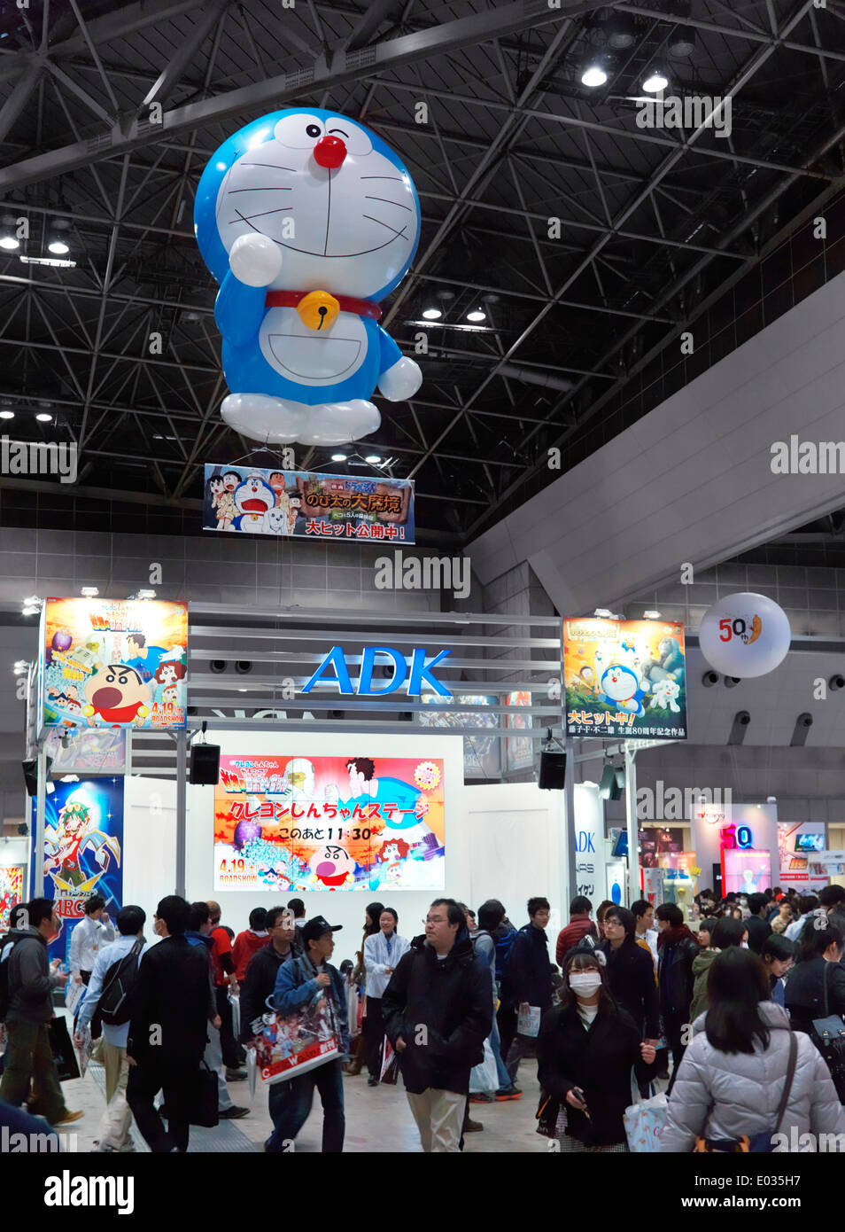 Japanese female dressed in as Maka Albarn with Soul Eater Scythe poses in  front of image of her anime character, Tokyo International Anime Fair,  Japan Stock Photo - Alamy