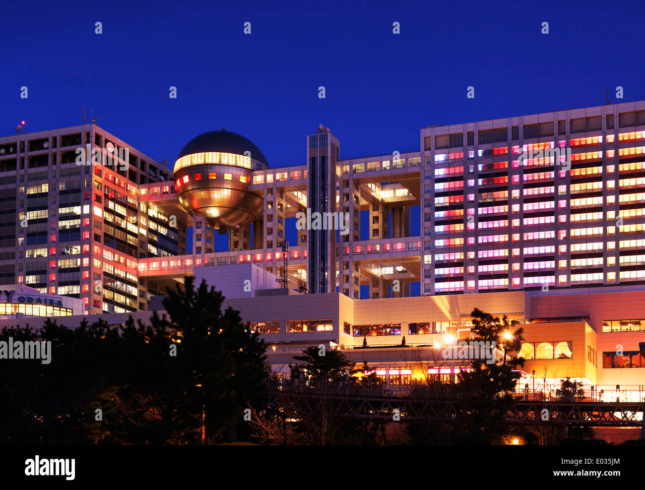 Fuji Television Headquaters building with colorful illumination at night in Odaiba, Tokyo, Japan Stock Photo