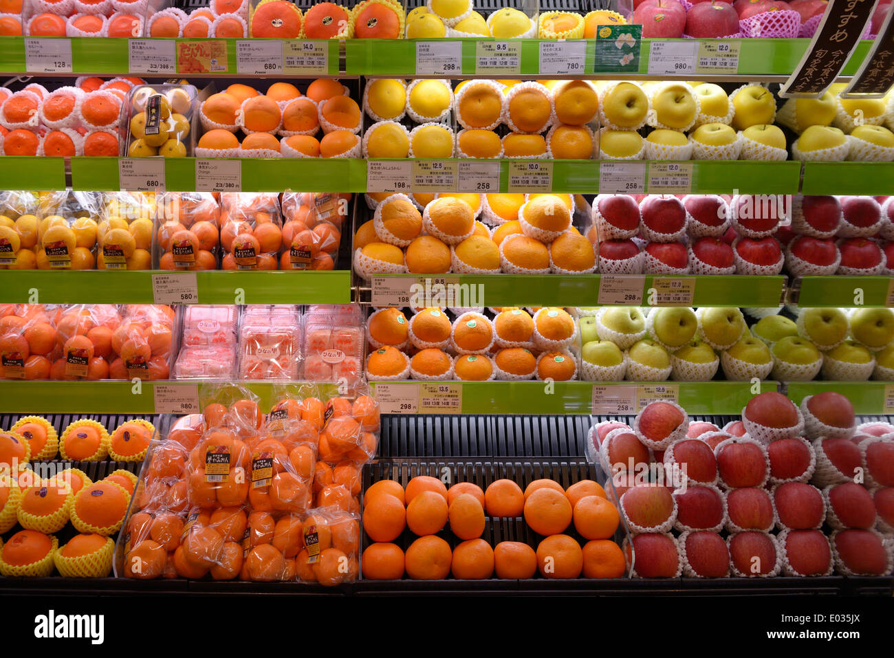 Variety of fruits on display in a Japanese supermarket. Tokyo, Japan. Stock Photo