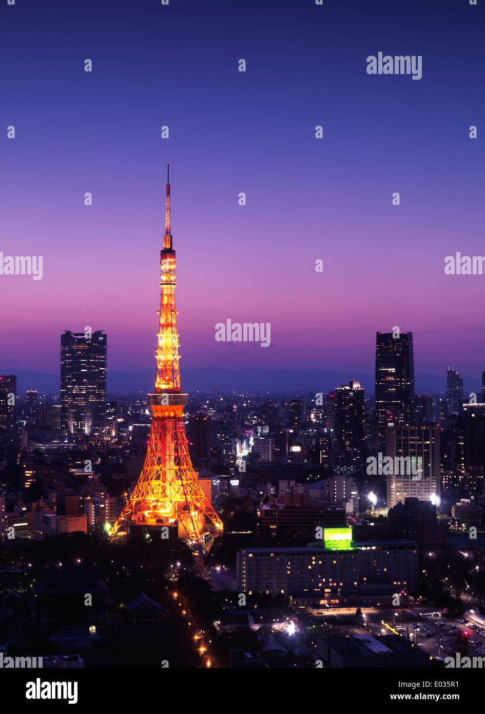 License available at MaximImages.com - Tokyo tower at night over purple twilight sky. Minato, Tokyo, Japan. Stock Photo