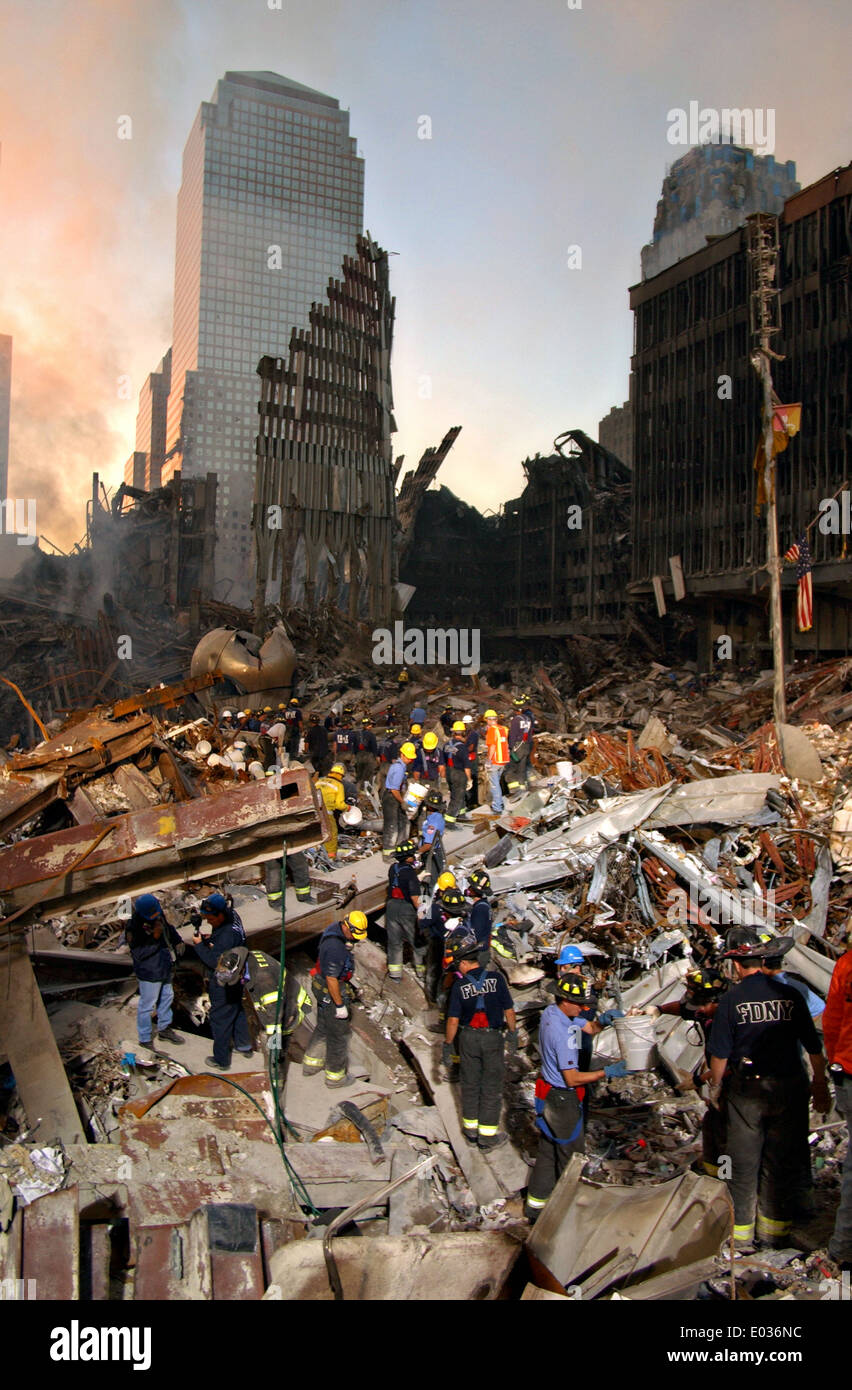 Urban Search and Rescue teams search for survivors amongst the wreckage of the World Trade Center following a massive terror attack which destroyed the twin towers killing 2,606 people September 16, 2001 in New York, NY. Stock Photo