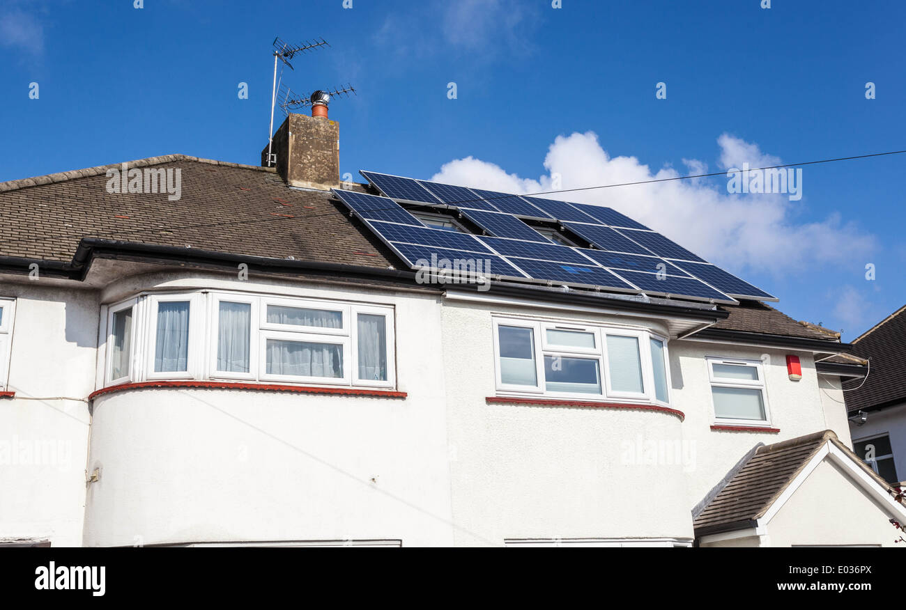 Solar panels on the roof of a house, London, England, UK. Stock Photo