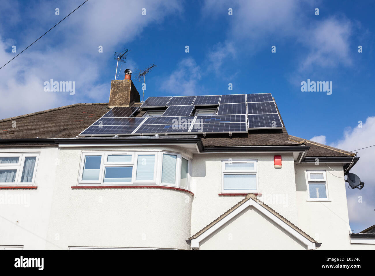Solar panels on the roof of a house, London, England, UK. Stock Photo