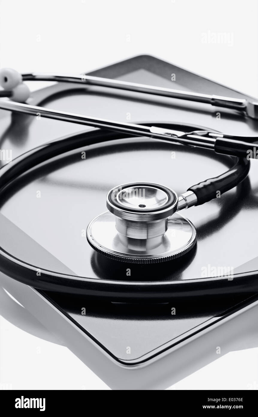 Digital tablet and stethoscope Stock Photo - Alamy